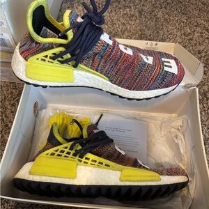 Adidas x Pharrell Williams Hu NMD “Multicolor” sneakers.